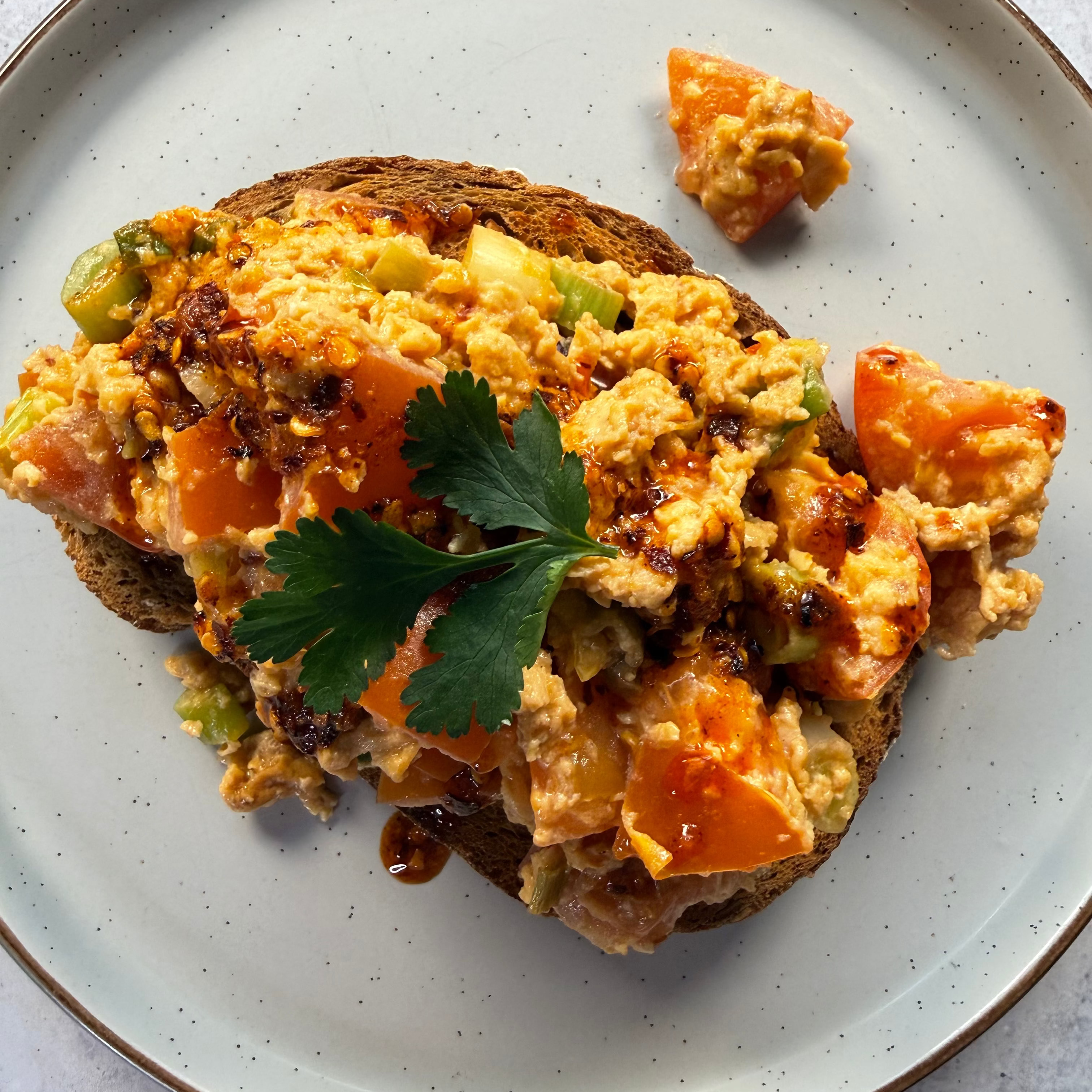 Spicy Egg & Tomato Scramble on Toast